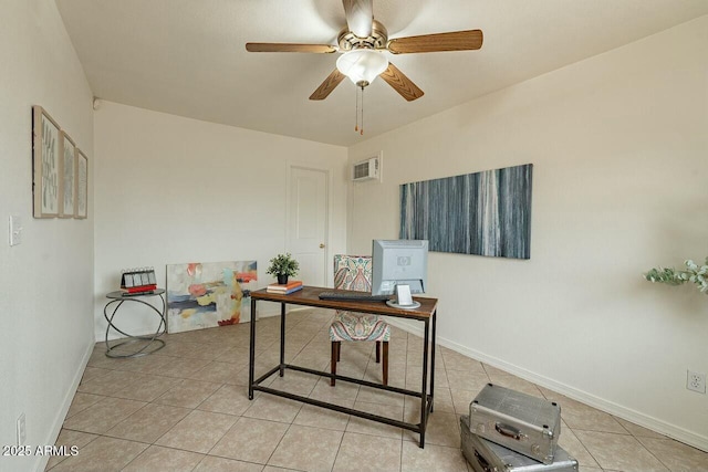 home office featuring light tile patterned floors, a ceiling fan, visible vents, and baseboards