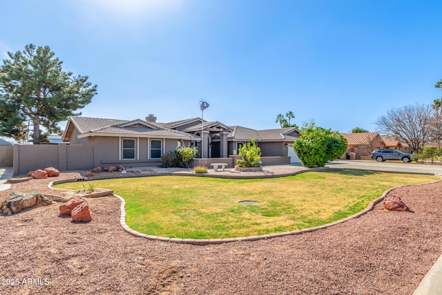 ranch-style home featuring a front lawn