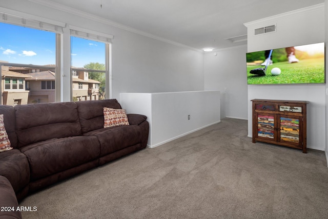 carpeted living room with ornamental molding