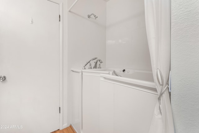 bathroom featuring hardwood / wood-style flooring