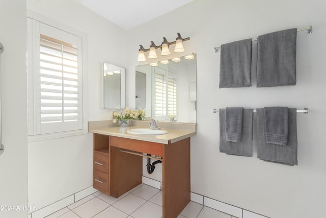 bathroom featuring tile patterned floors and vanity