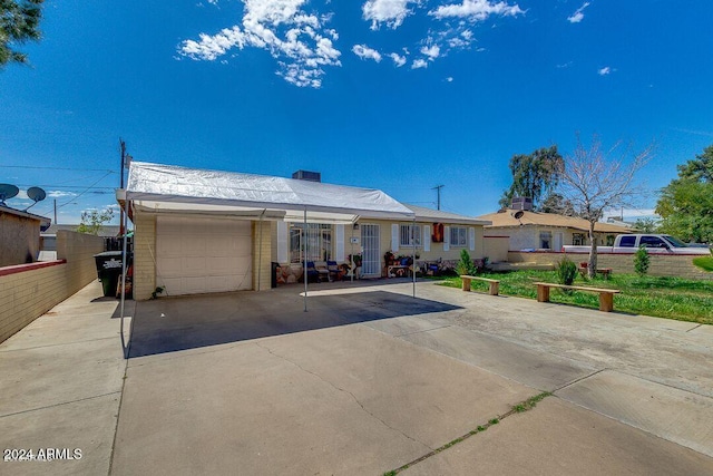 ranch-style home with a garage