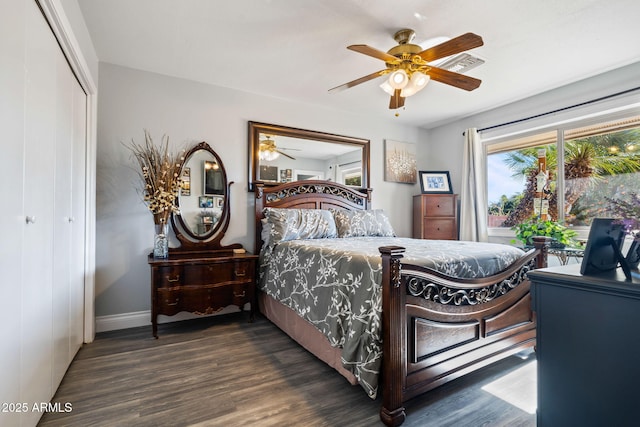 bedroom with a closet, ceiling fan, and dark hardwood / wood-style floors