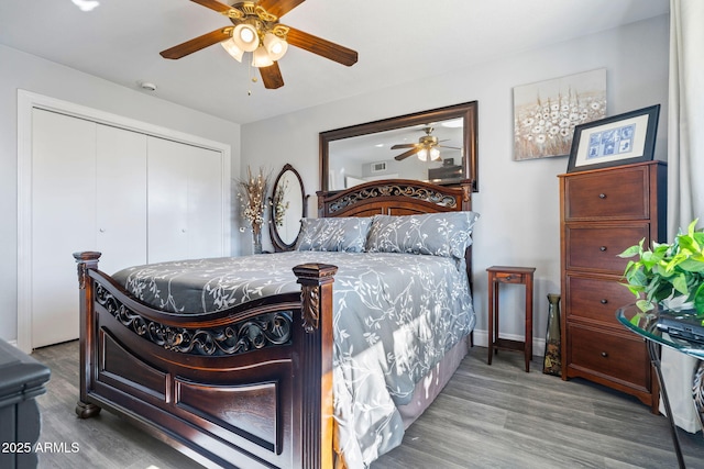 bedroom featuring a closet, ceiling fan, and hardwood / wood-style flooring