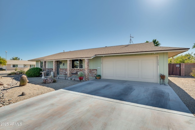 ranch-style home featuring a garage