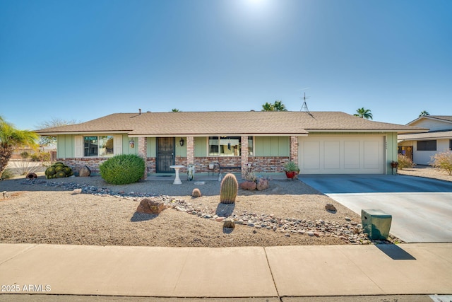 ranch-style home with a garage