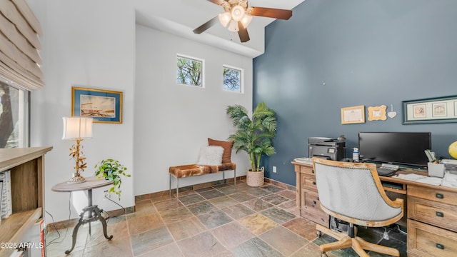 7130 E Saddleback St Unit 58, Mesa, AZ 85207 - office area with stone tile floors, a ceiling fan, and baseboards