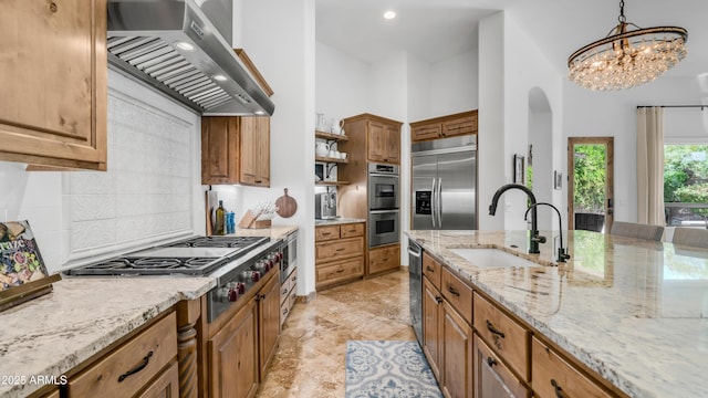 7130 E Saddleback St Unit 58, Mesa, AZ 85207 - kitchen with exhaust hood, a sink, built in appliances, tasteful backsplash, and open shelves