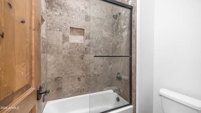 7130 E Saddleback St Unit 58, Mesa, AZ 85207 - bathroom with toilet and enclosed tub / shower combo