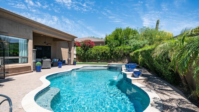 7130 E Saddleback St Unit 58, Mesa, AZ 85207 - view of pool featuring a ceiling fan, a patio area, and a pool with connected hot tub