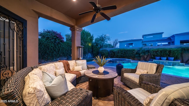 7130 E Saddleback St Unit 58, Mesa, AZ 85207 - view of patio / terrace featuring an in-ground hot tub, an outdoor hangout area, and a ceiling fan