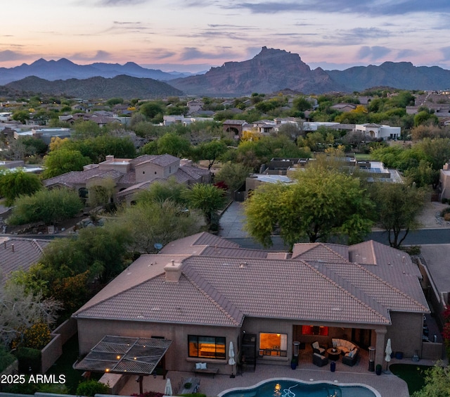 7130 E Saddleback St Unit 58, Mesa, AZ 85207 - aerial view at dusk of a mountain view and a residential view