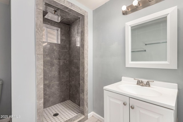 full bathroom featuring a shower stall and vanity