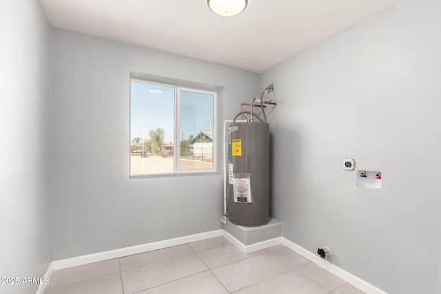 utility room featuring electric water heater