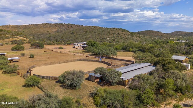 aerial view featuring a rural view and a mountain view