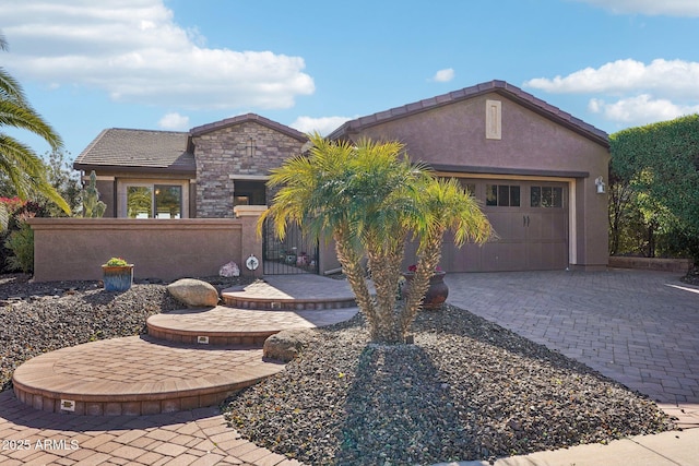 view of front of home with a garage