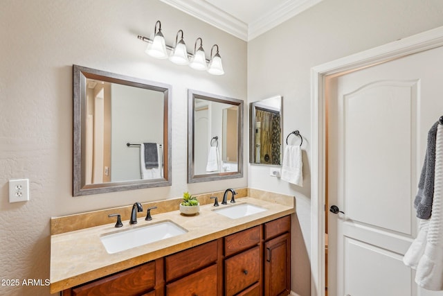 bathroom featuring ornamental molding and vanity