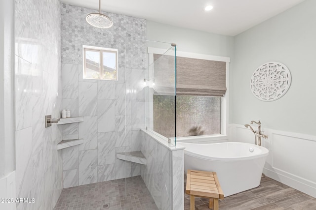 bathroom featuring independent shower and bath and hardwood / wood-style flooring