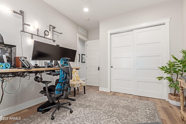 home office featuring light wood-type flooring