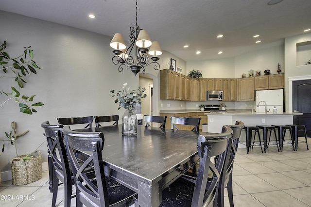 tiled dining space with a notable chandelier and a towering ceiling