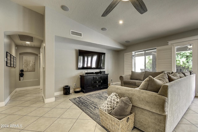 living room featuring light tile patterned flooring, lofted ceiling, and ceiling fan