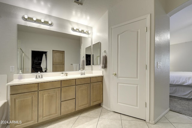 bathroom featuring vanity and tile patterned floors