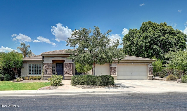 view of front of home with a garage