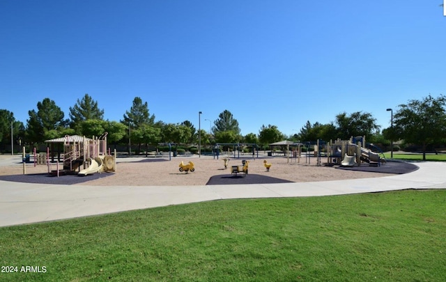 view of jungle gym with a yard