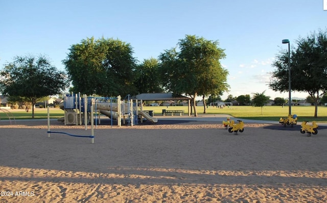 view of jungle gym featuring a yard