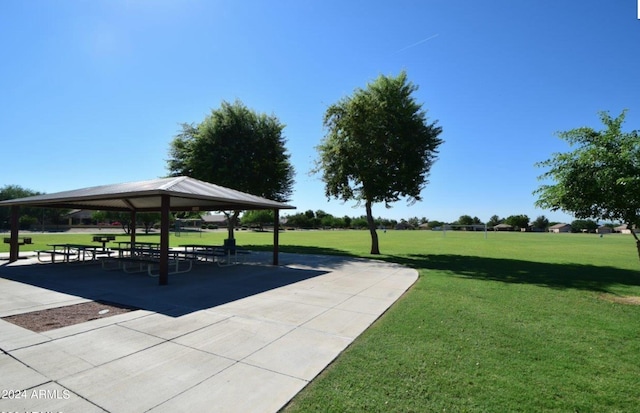 view of home's community featuring a gazebo and a yard