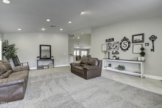 tiled living room featuring ceiling fan