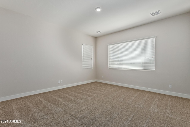 spare room with carpet flooring