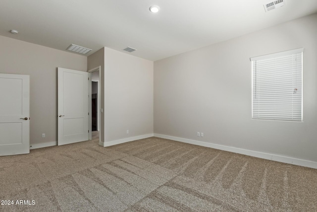 unfurnished bedroom featuring carpet