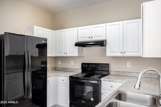 917 E Agua Fria Ln, Avondale, AZ 85323 - kitchen featuring under cabinet range hood, electric range, freestanding refrigerator, and a sink