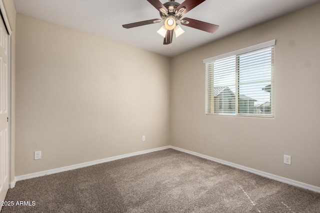 917 E Agua Fria Ln, Avondale, AZ 85323 - spare room with carpet flooring, ceiling fan, and baseboards