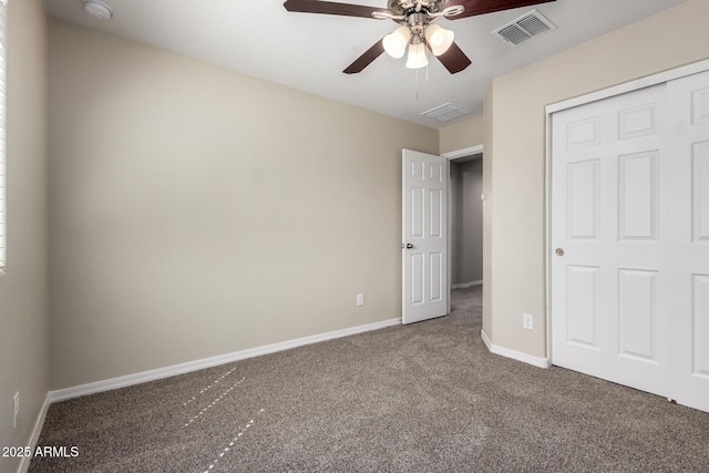 917 E Agua Fria Ln, Avondale, AZ 85323 - unfurnished bedroom with carpet flooring, baseboards, a closet, and ceiling fan