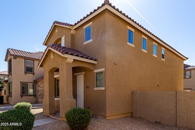 917 E Agua Fria Ln, Avondale, AZ 85323 - rear view of house featuring a tile roof and stucco siding