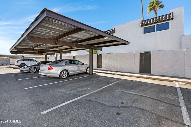 view of parking featuring a carport