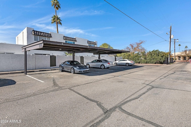 view of car parking featuring a carport