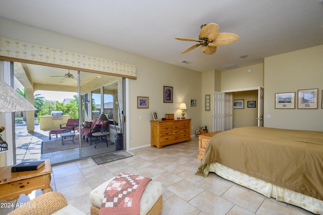 tiled bedroom featuring ceiling fan and access to outside