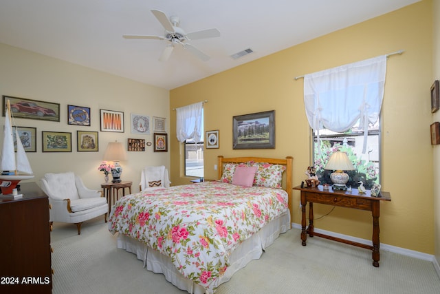 carpeted bedroom featuring ceiling fan