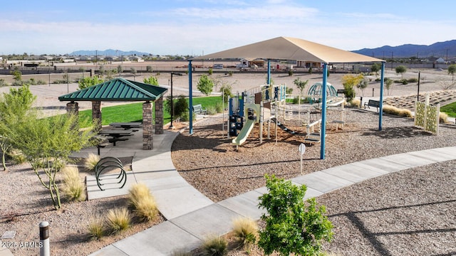 community playground featuring a mountain view and a gazebo