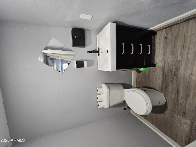 bathroom with a textured ceiling