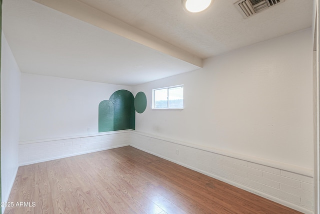 512 N Ironwood, Mesa, AZ 85201 - empty room with wood finished floors and wainscoting