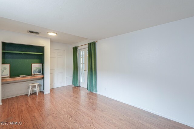 512 N Ironwood, Mesa, AZ 85201 - unfurnished bedroom with wood finished floors and baseboards
