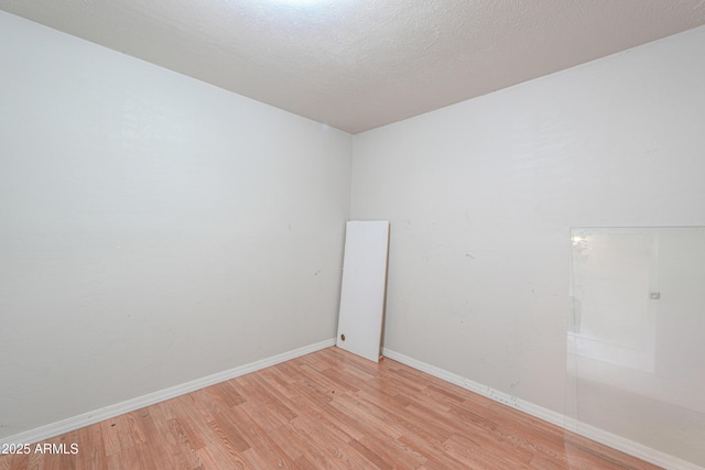 512 N Ironwood, Mesa, AZ 85201 - empty room featuring light wood-style floors and baseboards