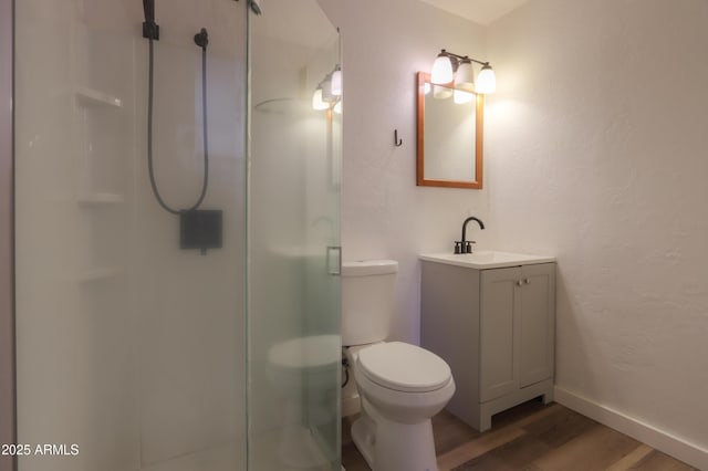 512 N Ironwood, Mesa, AZ 85201 - bathroom with wood finished floors, a shower stall, vanity, toilet, and a textured wall