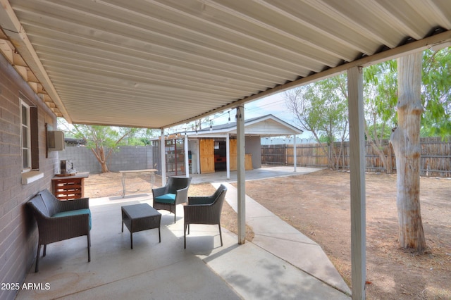 512 N Ironwood, Mesa, AZ 85201 - fenced backyard with a patio, an outdoor structure, and an outdoor living space