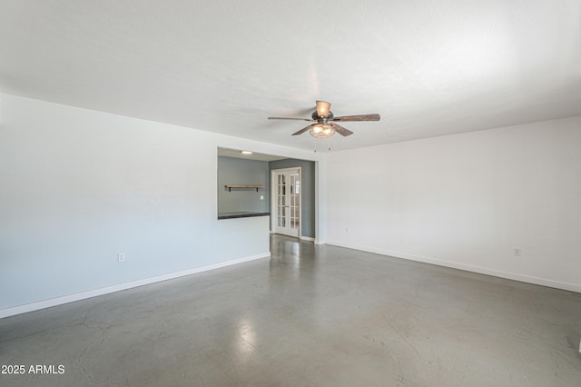512 N Ironwood, Mesa, AZ 85201 - empty room featuring a ceiling fan, concrete floors, and baseboards