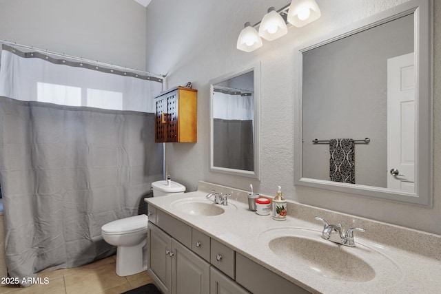 1231 E Sunburst Ln, Tempe, AZ 85284 - bathroom with double vanity, toilet, tile patterned flooring, and a shower with shower curtain